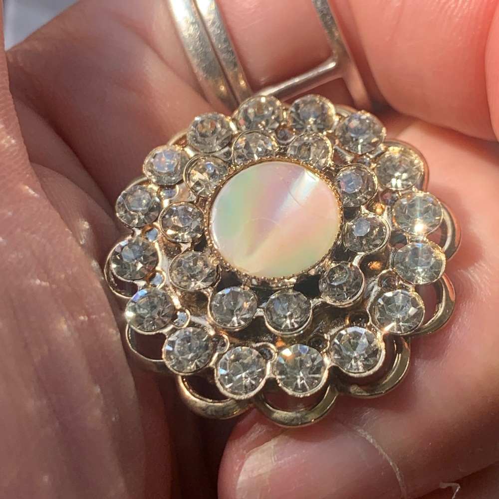 Vintage mother of pearl and rhinestone brooch gold-tone